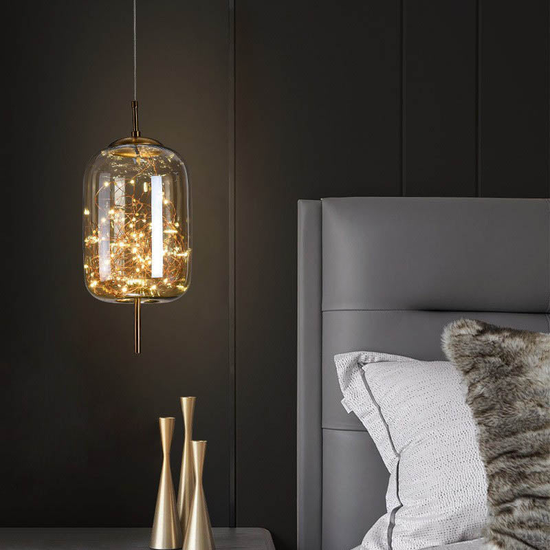 Urokliwa skandynawska szklana lampa wisząca LED o ciepłym designie – dostępna w bursztynowym lub antracytowym wykończeniu