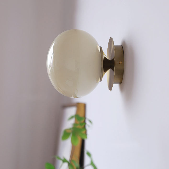 Nowoczesna lampa ścienna ze szkła i żelaza – dostępna w różowym, beżowym i białym kolorze