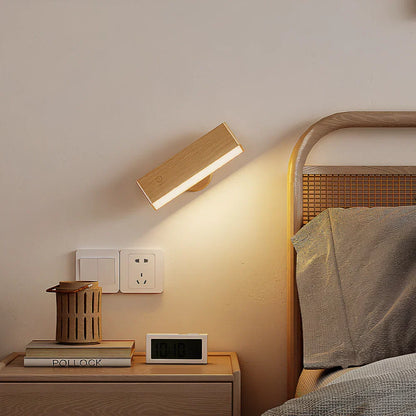 Elegancka obrotowa lampa ścienna z magnetycznym mocowaniem