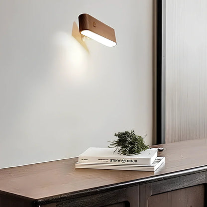 Elegancka obrotowa lampa ścienna z magnetycznym mocowaniem