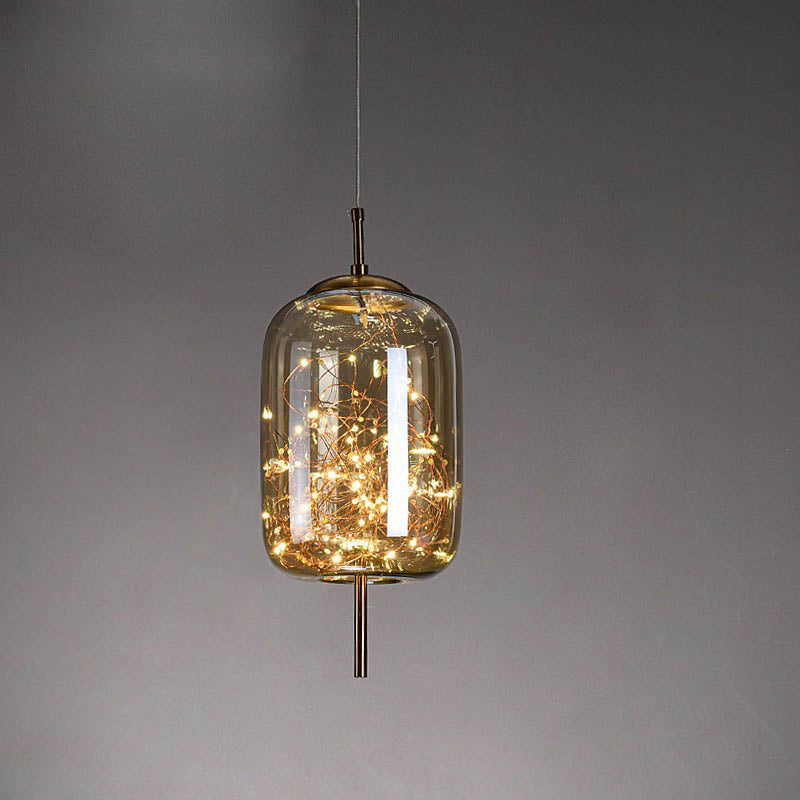 Urokliwa skandynawska szklana lampa wisząca LED o ciepłym designie – dostępna w bursztynowym lub antracytowym wykończeniu